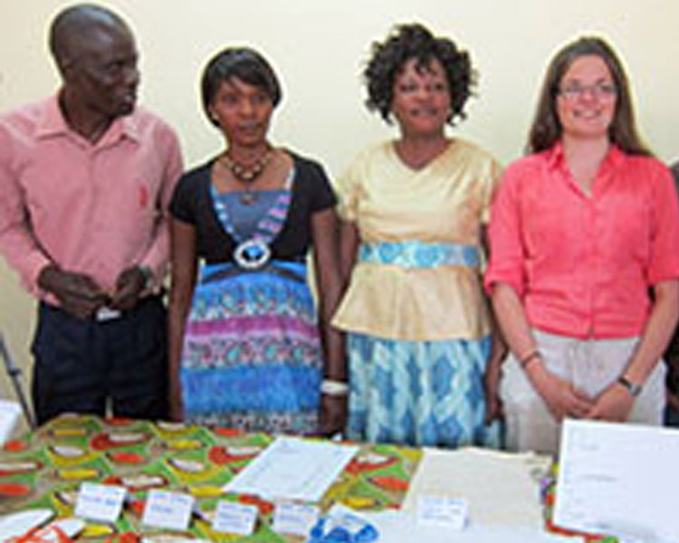 Martin (far left) presents with his menstrual hygiene team and their prototypes at the International Development Design Summit in Zambia.