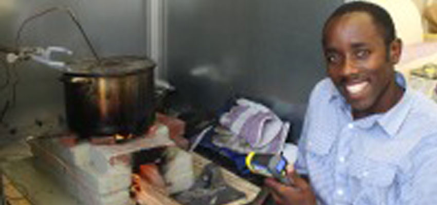 D-Lab Visiting practitioner Elius Muhimbise from Uganda evaluates his low-cost mud/brick wood stove