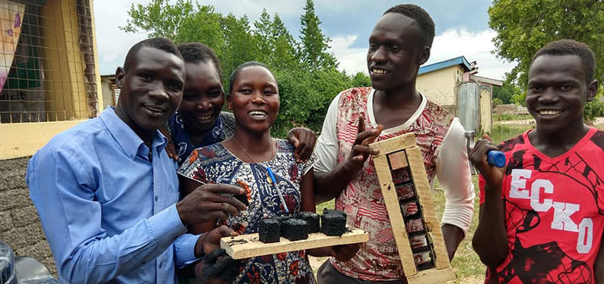 Saka, a charcoal-from-waste team, got started at a June 2019 Creative Capacity Building workshop in Rhino Refugee Settlement, Uganda. 