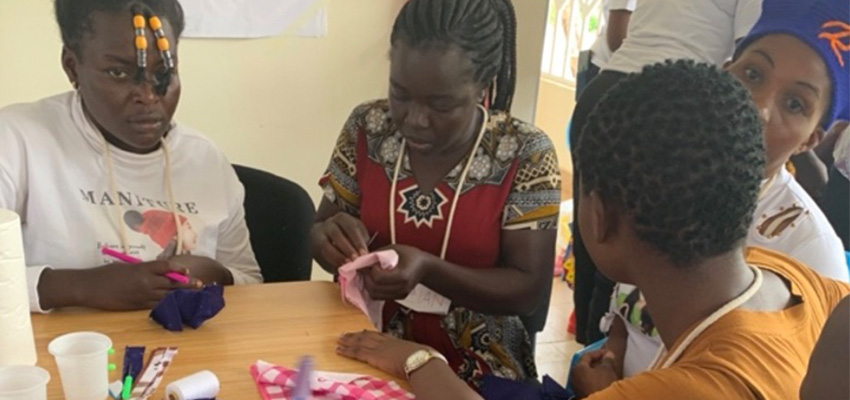 Women designing and creating menstrual pad prototypes in a workshop designe by MIT D-Lab in partnership with the Society Empowerment Project, a community-based organization in Oyugis, Kenya.
