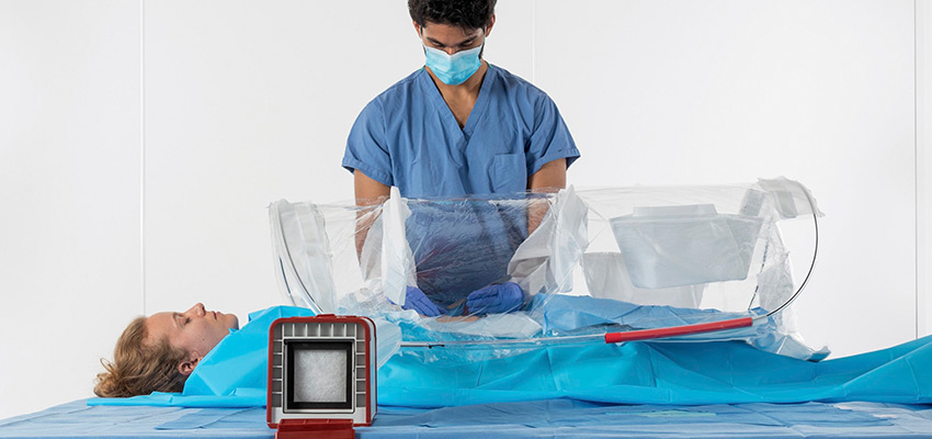 The MIT D-Lab-supported startup SurgiBox has developed a portable kit that doctors can use to create sterile operating environments in low-resource environments. The SurgiBox system includes a bubble with armholes facing inward, a module that filters and controls air flow, and a battery. The entire thing fits inside of a backpack and can be set up in minutes. Credits: Image: Courtesy of SurgiBox 