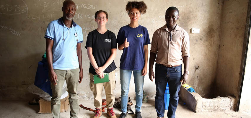 From left to right: Yahayah, oil vendor; Olyvia Hanken-Arlen, Wellesley ‘25; Sabrina Hare, MIT ‘23; Johnson Asante, KNUST. Photo was taken in Yahayah’s concrete floored shop, which was rare among oil dealers in Suame Magazine. Photo: Courtesy MIT D-Lab