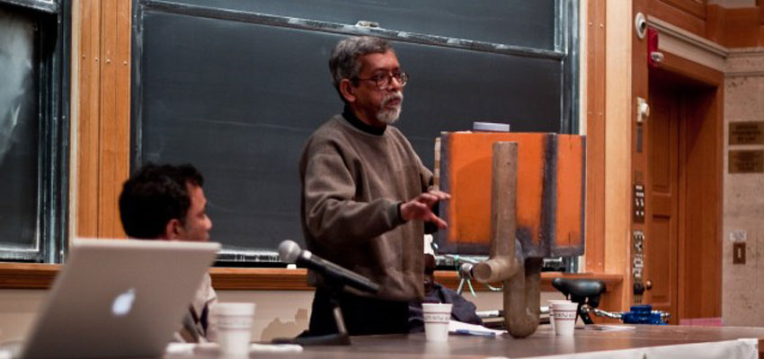 Presenter Suprio Das demonstrating his chlorine doser prototype. Photo: Nathan Cooke. Source: D-Lab Archives.