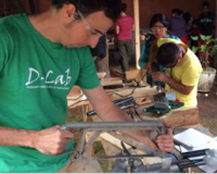 Victor demonstrating woodworking skills at a Creative Capacity Building workshop in Guatemala. 