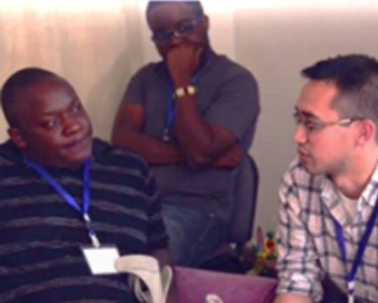 Bryan Ranger talking with Fred Ouko, Director of Action Network for the Disabled, in Nairobi, Kenya.