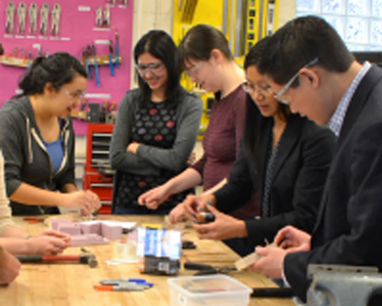 D-Lab staff, students, and PIA members share a worktable