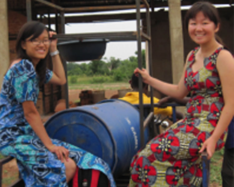 “Hope in Flight” students Yiping Xing and Coyin Oh with their Black Soldier Fly composter in Tamale, Ghana
