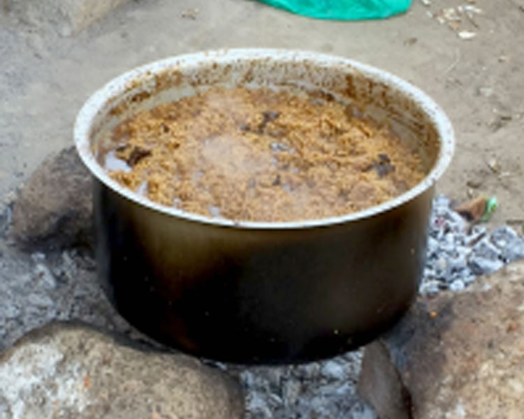 Traditional three-stone fire.