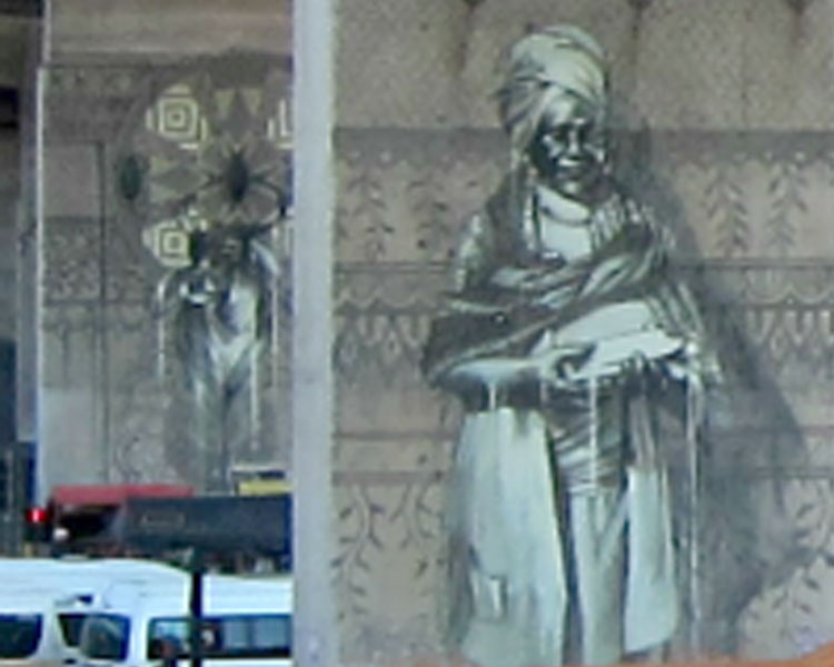 Murals memorializing local traders near the Early Morning Market.