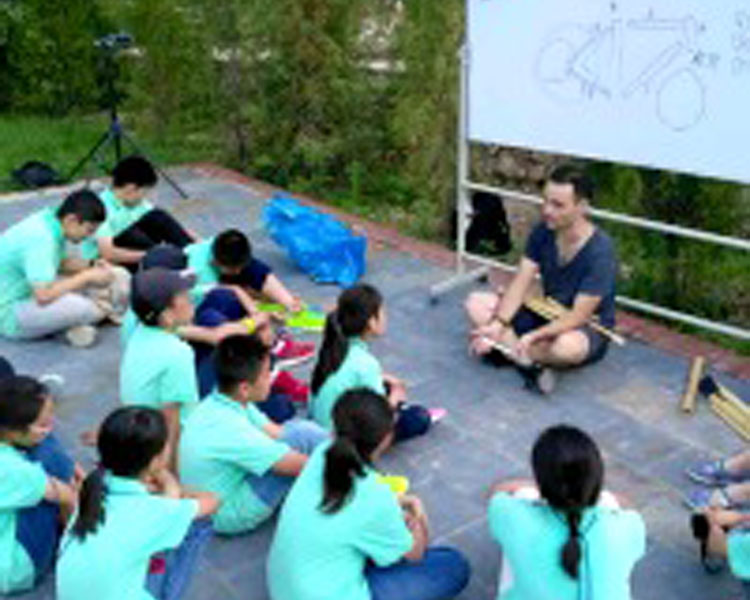 Teaching bike mechanics to middle school students in the countryside outside of Beijing.
