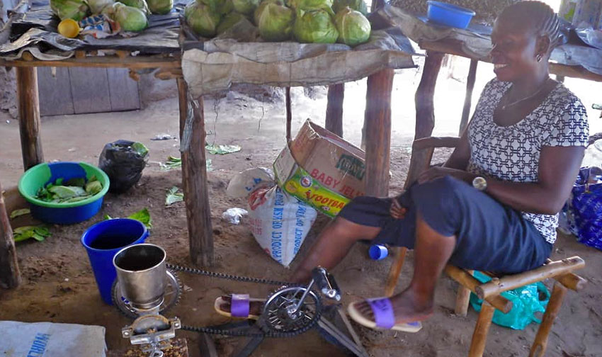 Making groundnut paste to sell in Rhino Camp. Photos: Vivian Amuna and Richard Maliamungu