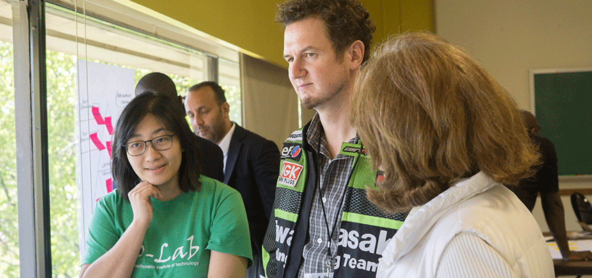 Scale-Ups Fellows Kristin Kagetsu (left) and Matt Orosz (right) discuss the Partnership Canvas