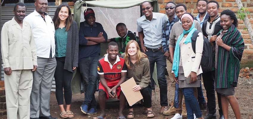 Emily Young '18 (third from left) and Eva Boal '18 (front right) of the Okoa Project with interns from Mbeya University of Science and Technology.