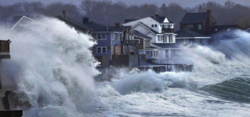 Ocean waves crash over a seawall and into houses along the coast in Scituate, Mass., Thursday, March 7, 2013. Reference: http://www.gazettenet.com/home/4968871-95/storm-thursday-snow-areas