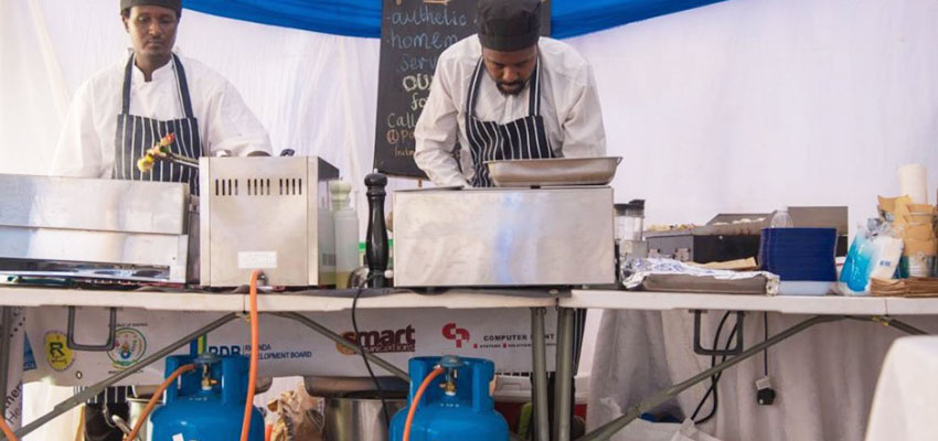 Two chefs prepare food using BBOXX Cook LPG at the unveiling of the next-generations utility's PAYG service for clean cooking with LPG and biogas, in Kigali, Rwanda, on 19th July. PICTURE: Handout via ©BBOXX