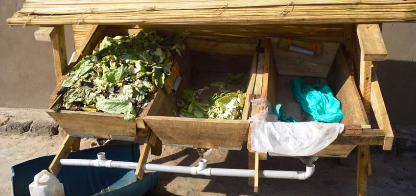 Compost being made outside of Bayiga’s house in Rhino Camp. Photo: Richard Maliamungu