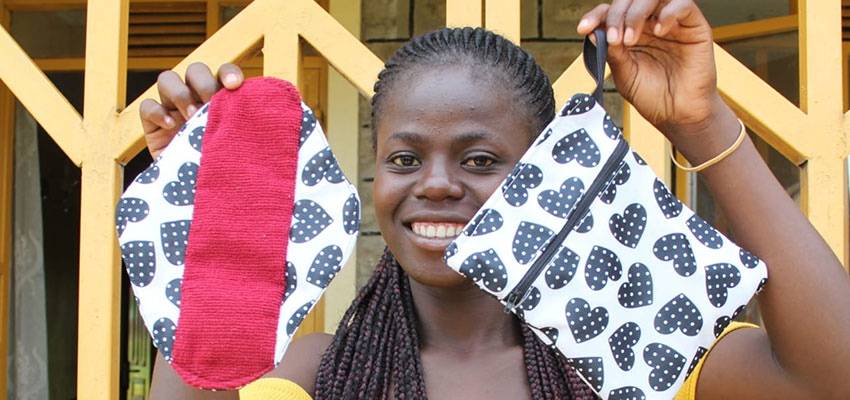 Woman with handmade menstrual pads, Kenya.