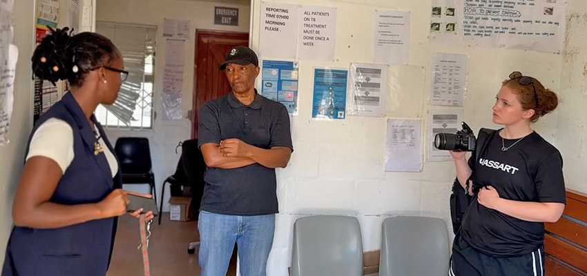 Madeleine (right) speaks with the Director Of Community Health Workers and Lebogang Molete of the PHELA Foundation inside Langa’s Wellness Centre. Photo: Michela Galazzi
