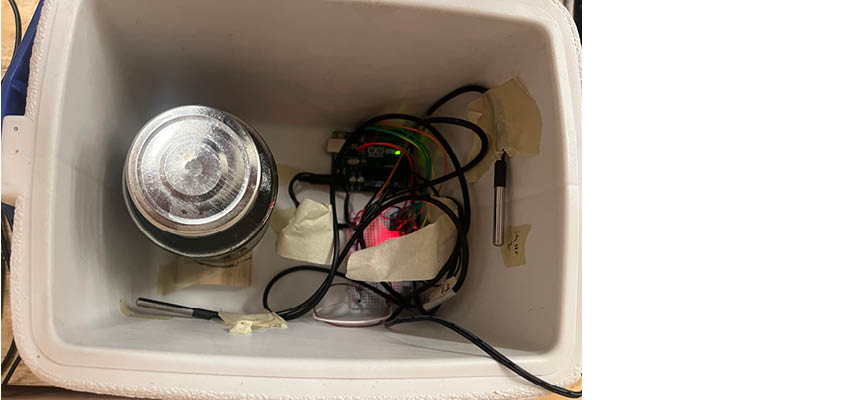 Thermal batteries in a plastic bin.