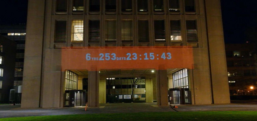 MIT Climate Clock on the lower panel of the Green Building on April 22 (Earth Day), 2021. MIT D-Lab / YouTube. Photo: Gaurav Patekar.