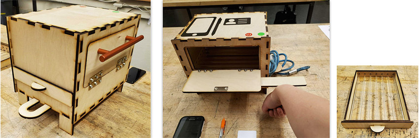 Figure 1: Iterations of the prototype made from laser-cut wood to perform initial user testing.  From this, the requirement to have a removable set of quartz rods became a key design requirement for our product.