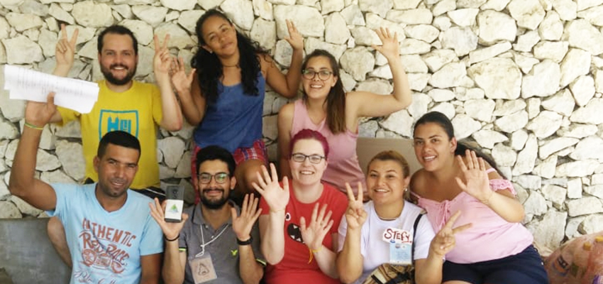 Team SaniCiénaga, ready to lend a hand to the co-creation process. Front row: Nabil Renterías (Colombia), co-facilitator Carlos Jhosua Walteros (Colombia), me, Stefanni Torres (Colombia), Viviana Ruiz de la Cruz (Colombia). Back row from left: Alejandro Pérez (Chile), Indira Cárdenas (Colombia), Alejandra Villagrán Hernández (Mexico). Photo credit: Natalia Burgos.