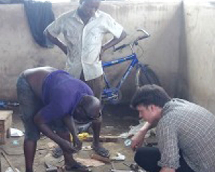 Working on the cargo tricycle for Wecylers in Lagos.