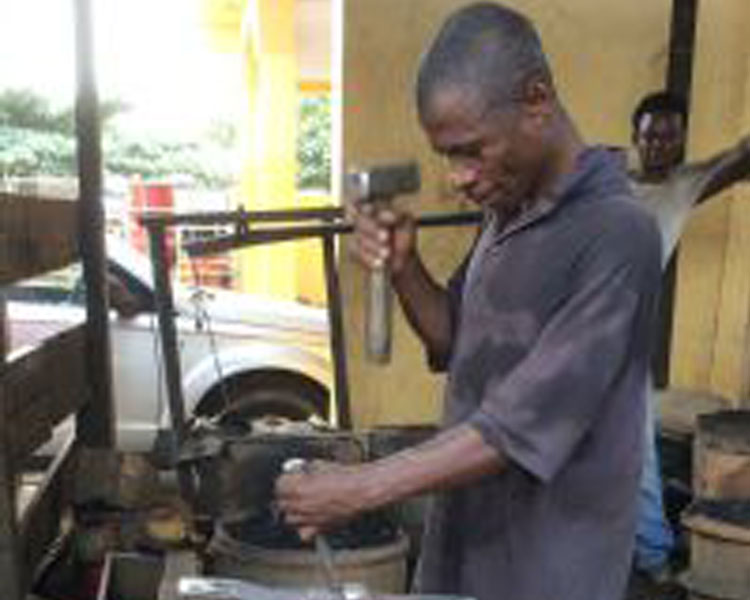 Metal worker, Suame Magazine, Kumasi, Ghana.