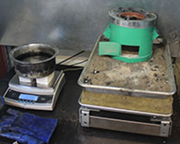 HFI partner Green Bio Energy's "Briketi" cookstove is prepared for testing