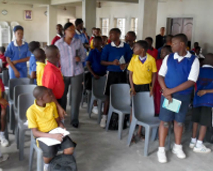 ​ Giving a lecture in a local school (Nigeria).  ​