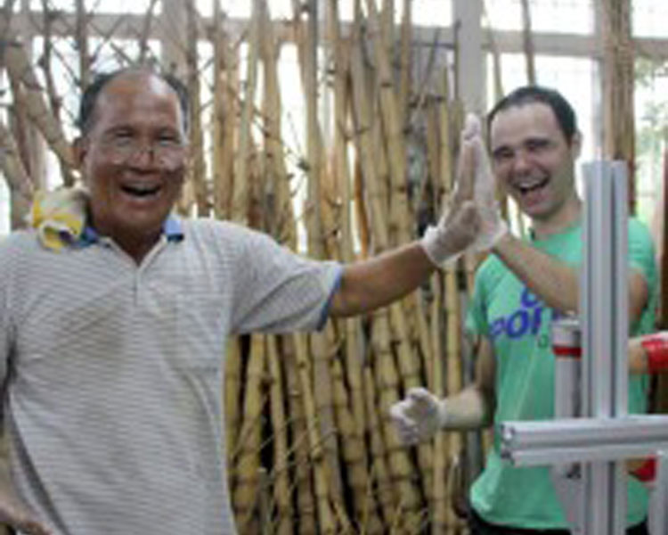 Teaching Teacher Liu to make his own bamboo bicycle. The Bamboo Culture Park plans to make 30 bamboo bikes for visitors to bike around the village and surrounding area.