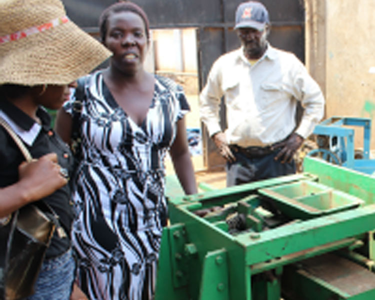 Betty visits the fabrication shop where AEST's briquetting machines are made.