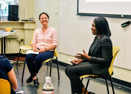 Instructor Elizabeth Hoffecker invites Ophelia Oni, Fidelity Bank Ghana limited, to share her experience with inclusive innovation in her work with the recycling system in Accra.