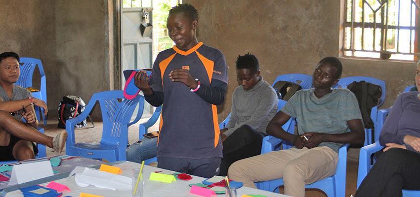 Participants showcasing their final reusable pad on the last day of the workshop. Oyugis, Kenya, January 2020.